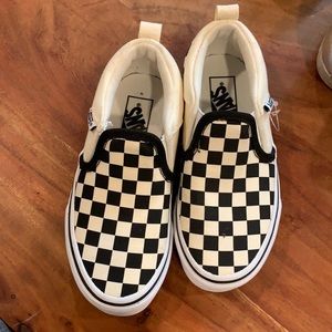 Classic Vans checkerboard slide on sneakers
